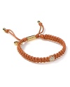 Weave haute hippie flair into your look with MICHAEL Michael Kors's braided leather bracelet. Slip on the high-texture style with a billowy blouse, flares and a foxy attitude.