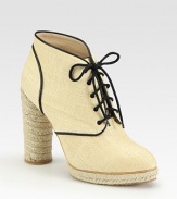 Artfully crafted, woven straw design with a lace-up front and an espadrille heel and platform. Stacked rope heel, 4½ (115mm)Covered platform, ½ (15mm)Compares to a 4 heel (100mm)Woven straw upperLeather liningRubber solePadded insoleImportedOUR FIT MODEL RECOMMENDS ordering one half size up as this style runs small. 