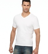 Short sleeve plain white shift with ribbed v-neck collar. Logo embroidered in white on left chest.