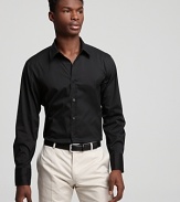 An ultraclean look. Cotton button-front shirt has spread collar, no pockets and a slightly lean fit.