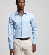 An ultraclean look. Cotton button-front shirt has spread collar, no pockets and a slightly lean fit.