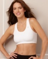 Create a smooth silhouette - with or without cups - for your low-impact workouts. Seamless sports bra by Jockey. Style #6997