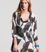 No matter the locale, Tommy Bahama's banana leaf-printed tunic is a tropical choice. When it's time to take cover, this graphic dress is seaside chic with flat sandals and frames.