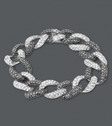 Links of luxury. Overlapping circles adorned with glittering marcasite and sparkling crystals create a luminous look on Genevieve & Grace's glamorous bracelet. Set in sterling silver. Approximate length: 7-1/4 inches.