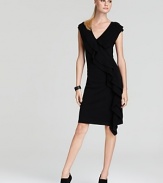 Ladylike ruffles embellish this merino wool Cynthia Steffe dress, putting a feminine spin on your fall office repertoire.