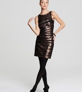 Define modern glamour in this Cynthia Steffe dress, shimmering with triangular bronze sequins under ruched black mesh. Black tights and heels polish off the look for a soirée-perfect finish.