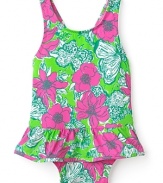 A sweet ruffle bottom adorns this one-piece swimsuit, printed with a classic Lilly Pulitzer floral motif.