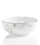 Wildflowers take off on glazed white porcelain, sparkling as they tumble aimlessly around the Platinum Silhouette cereal bowl from Charter Club dinnerware. The dishes have a banded edge that adds a classic touch to a pattern with modern spirit.