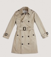 A handsome double breasted trench coat with a check lined collar and long sleeves.