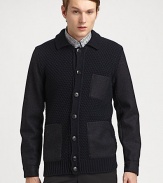 Chunky cardigan sweater knitted in superior wool with contrasting fabric sleeves for a handsomely modern finish.Button-frontChest, waist patch pocketsRibbed knit hemWoolDry cleanMade in Italy