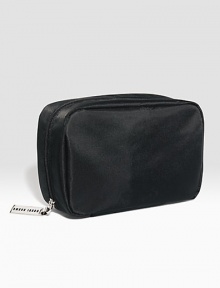 Now in sleek black nylon. The bag Bobbi uses most often for her everyday beauty essentials. Sized to hold staples like Lip Color, Everything Mascara, and Creamy Concealer Kit. Features interior pockets for small tools. (Cosmetics sold separately.) 