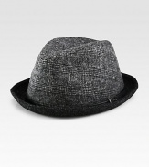 Defined by a slim, leather band this woven fedora is rendered in a superior virgin wool blend, a perfect fit for the distinguished gentleman.Virgin wool/polyamide/silkBrim, about 2Spot cleanImported