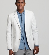 Casual elegance is effortless in a cotton-blend blazer from Theory.