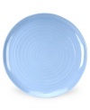 Like a blooming bed of forget-me-nots, this powder-blue porcelain serveware has a fresh, natural vibrance. A hand thrown texture gives the round platter the irresistible charm of traditional pottery.