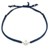 Anchors aweigh! This trendy wrap bracelet features a 14k gold anchor charm strung from a navy blue nylon rope cord. Approximate diameter: 2-1/4 inches (extends to 3-1/2 inches).