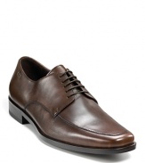 Square toe dress shoe with lace up front with top stitching detailing on front, rubber heel, slightly stacked.