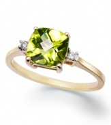 An elegant accent piece in your favorite hue. This exquisite ring features a cushion-cut peridot (1-5/8 ct. t.w.) and round-cut diamond accents at the sides. Set in 14k gold.