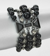 A romantic and modern style featuring a blend of faceted rhinestones, rich hemetite and smooth glass pearls. HematiteGlass stones and pearlsZinc and brassLength, about 7.5Spring ring closureImported 