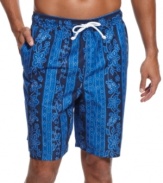 Designed for fun. Get in the right state of mind with these playful swim trunks from Club Room.