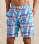 Plaid perfection. Ride a wave of preppy style at the beach this summer with these swim trunks from Tommy Hilfiger.