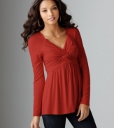 A swingy fit and twisted knot front makes Cha Cha Vente's top and alluring choice for day or night!