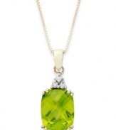 Take your look to the next level with the right amount of color. A rectangular-cut peridot (3-1/4 ct. t.w.) and a crown of diamond accents adds sparkle to this shining 14k gold necklace. Approximate length: 18 inches. Approximate drop: 3/4 inch.