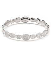 Textured 'pods' shine in silver plated brass in this infinity bangle from Melinda Maria.