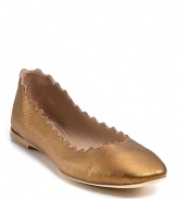 Spiky scallops make these classic ballet flats pretty tough. By Chloé.