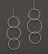 Interlocking 14K. yellow gold hoops evoke bohemian elegance. By Lana.