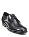 Superbly elegant lace-up shoes by To Boot New York lend polished poise to your look.