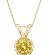 Add a touch of sunshine-bright color. A round-cut, bezel-set yellow diamond (1 ct. t.w.) shines in a luminous 14k gold setting. Approximate length: 18 inches. Approximate drop: 1/2 inch.