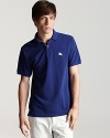 From Burberry comes a classic polo in three vibrant hues--the perfect staple, offering timeless wearability.