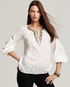 Diaphanous sleeves and a stone-and-bead embellished keyhole neckline deliver laid-back glamour to this MICHAEL Michael Kors top. Pair with curve-enhancing flared jeans and neutral-hued platforms for office-to-happy hour style.