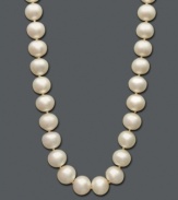 The perfect gift of timeless beauty. This versatile strand of cultured freshwater pearls (11-12 mm) comes in a 14k gold setting. Approximate length: 18 inches.