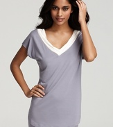 Exude laid-back chic in a soft pajama top with contrast V-neckline.