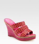 Chunky stacked wedge with braided espadrille trim and tastefully textured straps. Stacked wedge, 4 (100mm)Covered platform, 1 (25mm)Compares to a 3 heel (75mm)Leather upperLeather lining and solePadded insoleImported