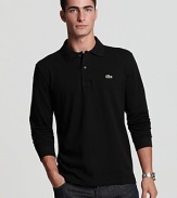 Lacoste's classic-fit polo with long sleeves, ribbed trim and embroidered logo at the left chest.