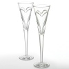 Enhance each toast you make at every special occasion. Where there is Love & Romance, there must be champagne! Whether celebrating your third date, 10th anniversary or millionth declaration of love, what better way to show it than with Waterford Crystal toasting flutes filled with champagne. These flutes were designed with a simple and elegant entwined double heart, representing the love and romance you share. Set of 2; 5 oz.