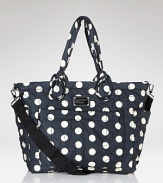 For the haute stroller mom, MARC BY MARC JACOBS' nylon baby bag is an ultra-cute essential. With plenty of pockets and a poppy print, this playful tote keeps your little one's essentials stowed in designer fashion.