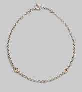 A bold sterling silver chain is accented by cloverleaf shapes of 18k gold in front and sterling silver at the closure. Sterling silver and 18k yellow gold Length, about 18 Toggle closure Made in Greece