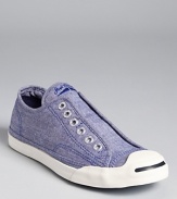 In chic chambray, these slip-on sneakers from Converse Jack Purcell offer laid-back style with a classic twist.