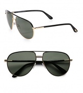 Must-have aviator frames crafted in lightweight metal with tubular temples. Available in black-gold with polarized green lens.Tubular temples100% UV protectionMade in Italy