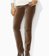 Designed in stretch velveteen for comfort and a flattering fit, these classic Lauren By Ralph Lauren jeans are designed in a sleek silhouette with a chic straight leg.