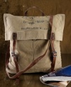 Washed-out military font and a square structure add vintage character to this rugged tote bag.