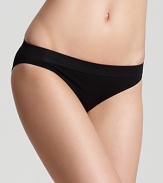 A sleek, basic bikini with gathered detail at back.