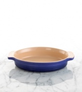 Prepare everything from peach cobbler to macaroni and cheese in this durable stoneware dish. Its practical shape and innovative surface goes from freezer to oven or microwave to the table for serving. Resists stains, cracks and odor retention. Side handles.