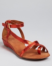 In hot metallic orange, Ash's Lips sandal offers searing summer style.