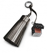 An elegant Burberry Beauty purse charm featuring a single check-engraved cube attached to a luxurious faux-leather tassel. The charm opens to reveal a natural cameo pink lip gloss to add a hint of colour for a fresh and moisturized glow. 