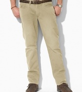 Casual pants tailored from sun-faded mid-weight chino, designed for authentic five-pocket styling and a straight leg. Standard-rise belted waist with Ralph Lauren's signature shank closure. Five-pocket jean styling with signature metal rivets. Flat-front with a timeworn, vintage feel.