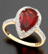 Elegance that suits you. This ring features pear-cut garnet (3-1/3 ct. t.w.) and round-cut diamond (1/10 ct. t.w.) set in 14k gold.